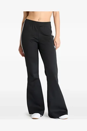 adidas Pantalones acampanados con rayas laterales