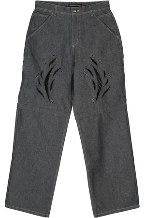 Andersson Bell Jeans anchos con cortes a láser