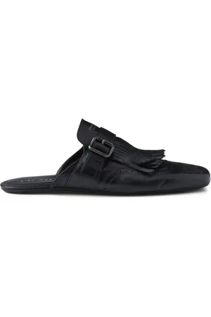 Prada Mules Shuffle de piel con flecos