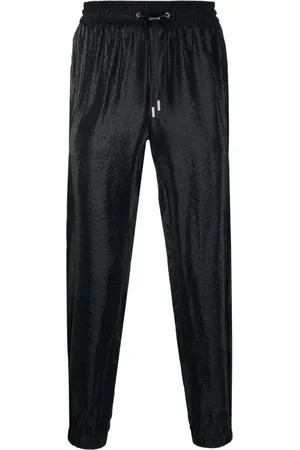 Saint Laurent Pantalones tapered con rayas laterales