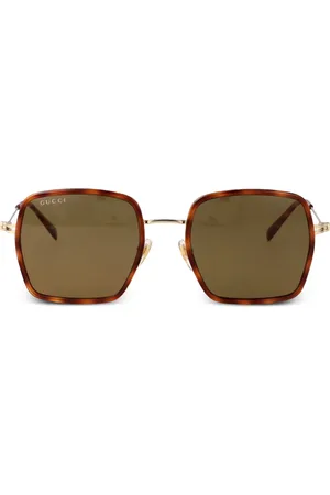 Gucci Lentes de sol con motivo G entrelazado