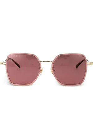 Gucci Lentes de sol con motivo G entrelazado