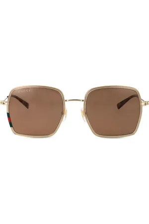 Gucci Lentes de sol con motivo G entrelazado