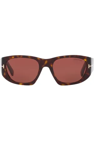 Tom Ford Lentes de sol con armazón redonda estilo carey