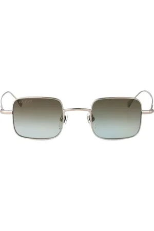 Gucci Lentes de sol con armazón cuadrada