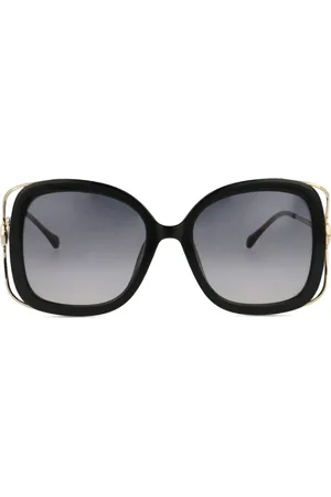 Gucci Lentes de sol con armazón oversize