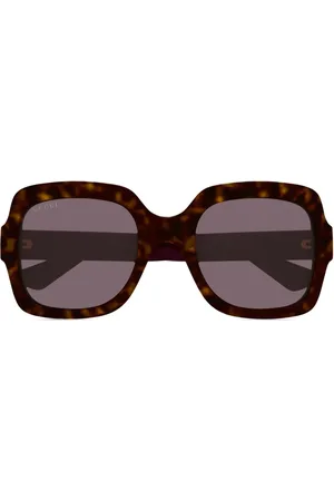 Gucci Lentes de sol con armazón oversize