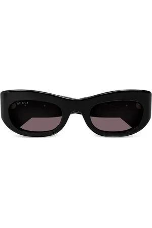 Gucci Lentes de sol con armazón ovalada