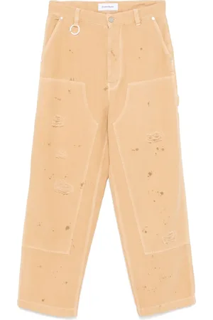 Etudes Pantalones con efecto envejecido