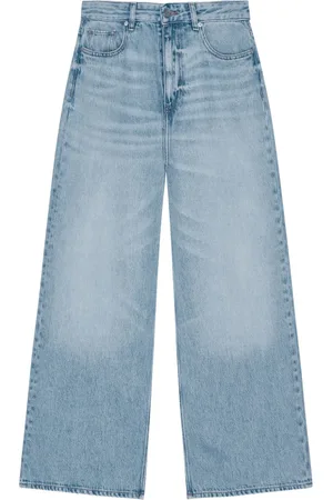 Ganni Jeans con efecto desgastado
