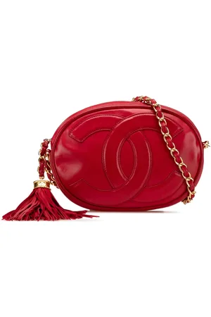 CHANEL Bolsa crossbody Oval Camera de piel de cordero con logo CC 1989-1991