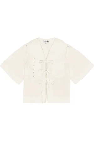 Ganni Blusa con moño en el cuello