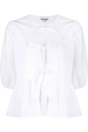 Ganni Blusa con peplum
