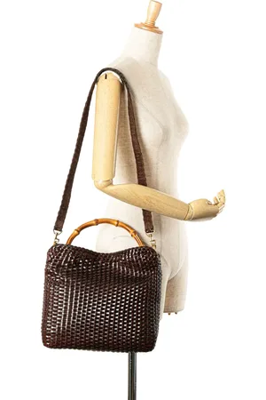 Gucci 20th Century Woven Leather Bamboo satchel