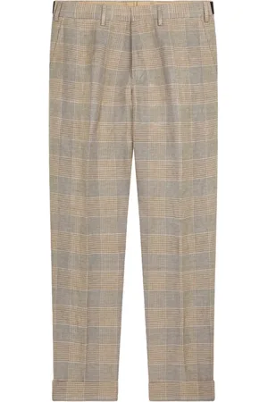 DRIES VAN NOTEN Pantalones ajustados con motivo de cuadros