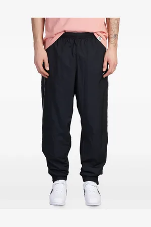 Nike Pants con motivo Solo Swoosh