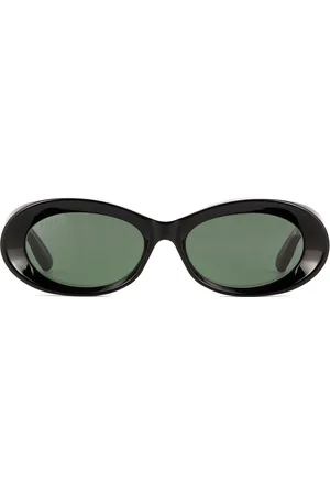 Gucci Lentes de sol con armazón ovalada
