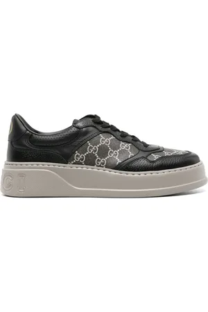 Gucci Tenis bajos con motivo GG