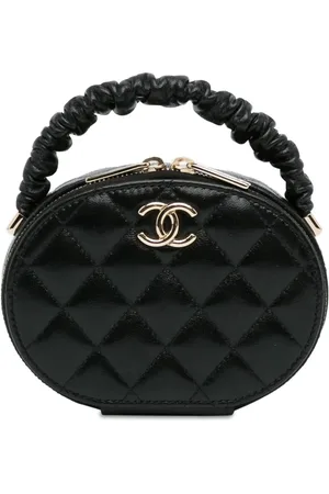 CHANEL Cosmetiquera con asa y logo CC 2021
