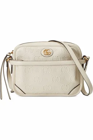 Gucci Bolsa crossbody con motivo GG y estrellas en relieve