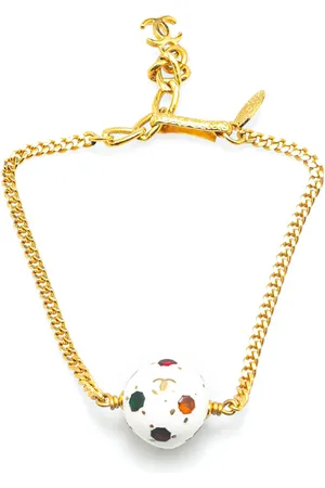 CHANEL Pulsera bañada en oro con dije de bola de fútbol 1998