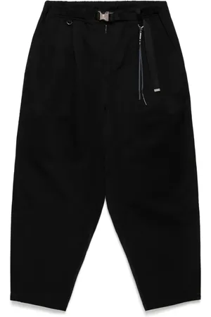 MASTERMIND Pantalones con logo bordado