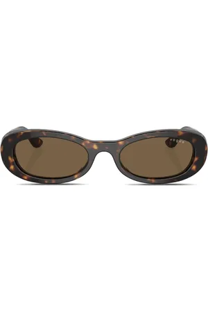 vogue Lentes de sol con armazón ovalada estilo carey