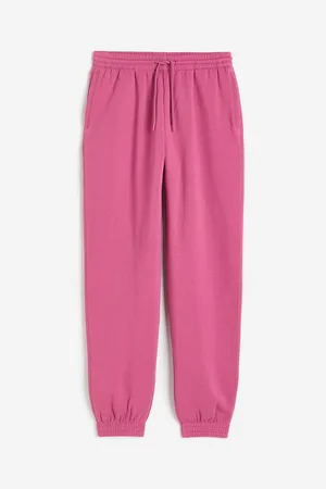 Joggers y Pants deportivos de color rosa para mujer