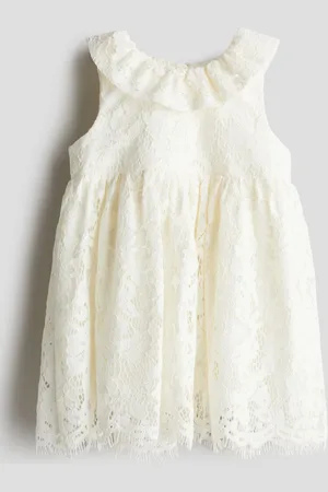 H&M Vestido de encaje con cuello de olán