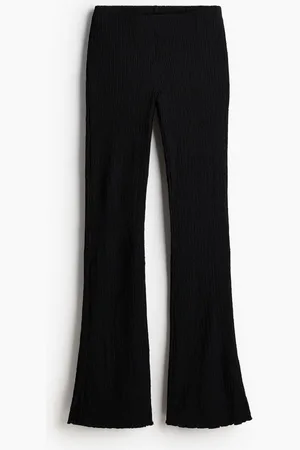 H&M Leggings acampanados con diseño texturizado