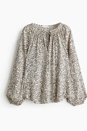 H&M Blusa oversized de crepé