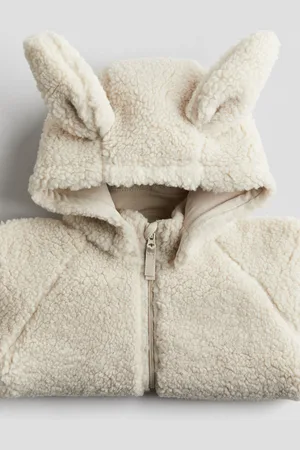 H&M Chamarra en tejido peluche con gorro