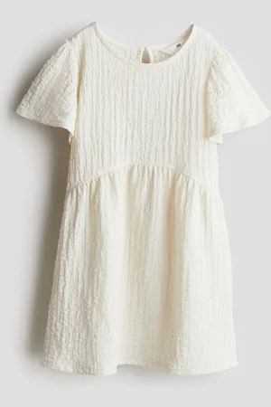 H&M Vestido en punto texturizado