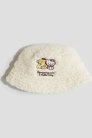 H&M Gorro pescador en tejido peluche con bordado