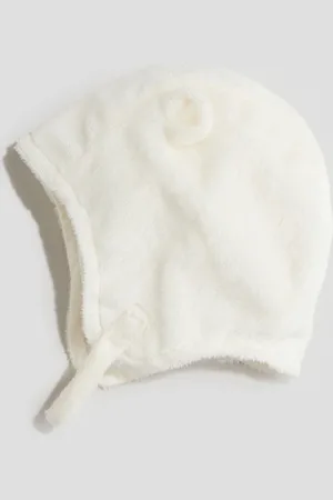 H&M Gorro en pelo sintético con aplicaciones