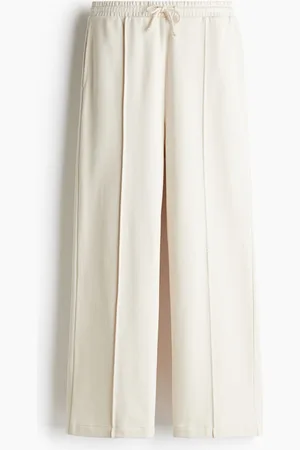 H&M Joggers con pliegues en las piernas