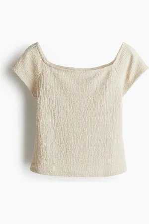 H&M Top en punto texturizado