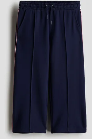 H&M Pantalón ancho con pliegues
