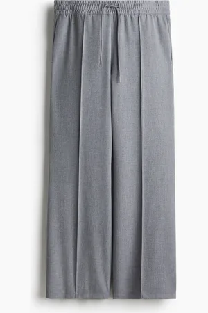 H&M Pantalón con cordón de ajuste y pliegues
