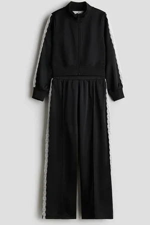 H&M Conjunto deportivo con detalles de encaje