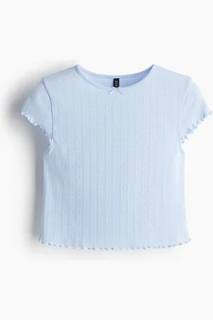 H&M Top de pointelle con detalle overlock