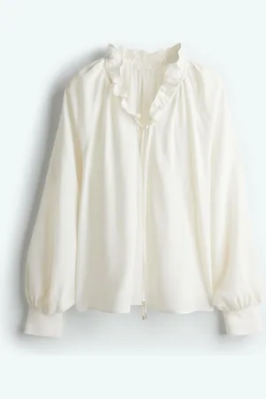 H&M Blusa con olanes y cordón de ajuste