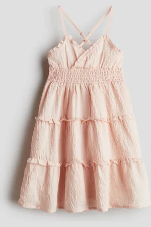H&M Vestido en punto smock con olanes
