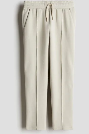 H&M Pantalón de piqué con tobillos ajustados