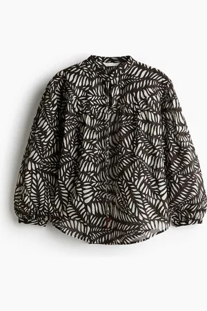 H&M Blusa oversized de algodón