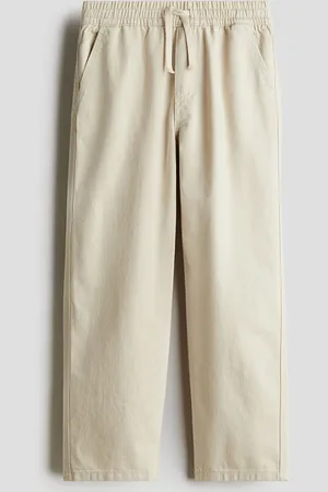 H&M Pantalón de corte amplio en sarga de algodón
