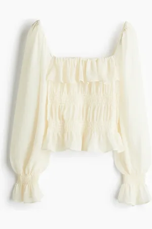H&M Blusa traslúcida con punto smock