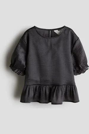 H&M Blusa con peplum