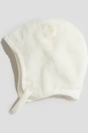 H&M Gorro en pelo sintético con aplicaciones