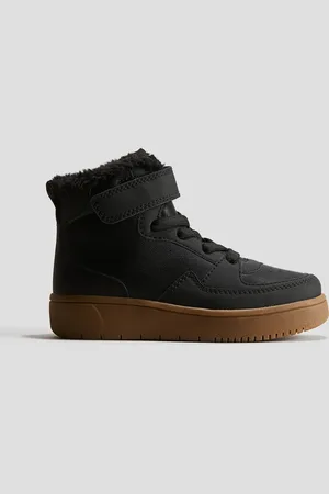 H&M Tenis altos con forro cálido